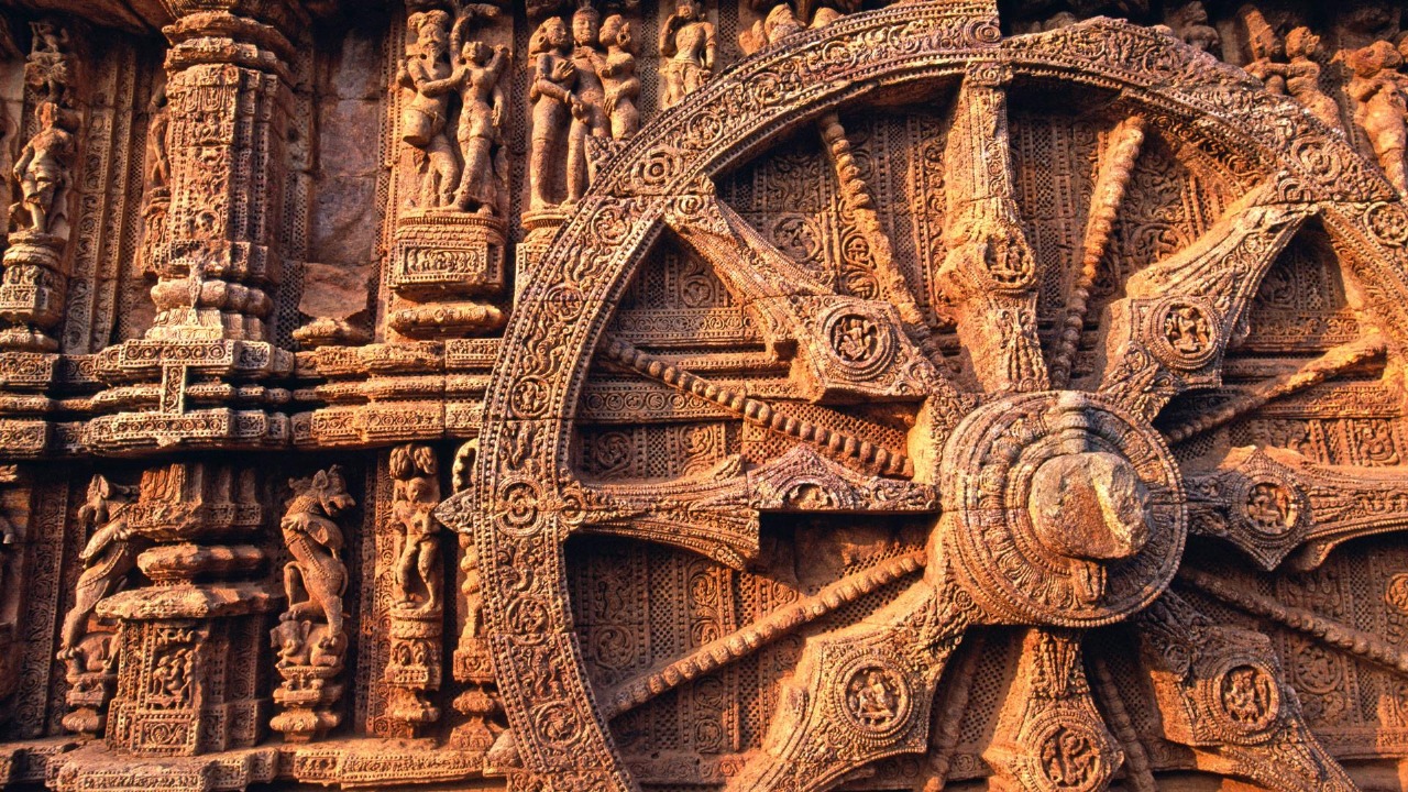 A vibrant and colorful collection of various fancy dress and cosplay costumes displayed on mannequins