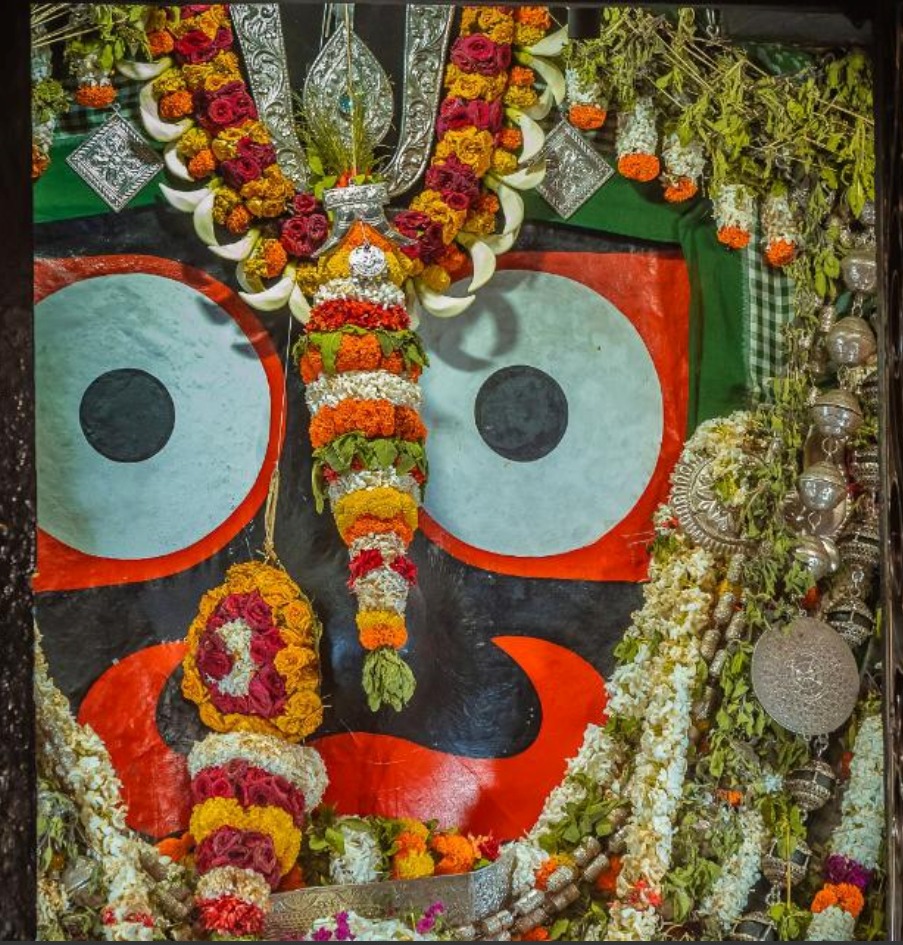 A headshot of a satisfied customer with a big smile